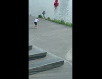 White shorts guy puts on sunglasses water