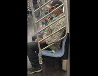 Man smokes cigarette inside subway 