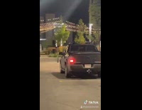 Parked black truck moves shakes guy mcdonalds 