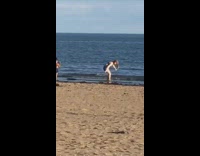 Kid films mom tiktok dance ocean water 