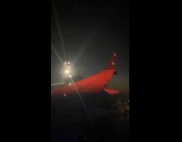 Time lapse plane wing storm clouds night