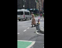 Guy leopard print dress fan dances street