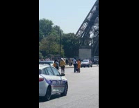 Collab IITW - Couple Take Pictures of Eiffel Tower on Road