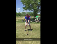 guy blue shirt drinking beer and playing golf