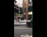 Police officer tackles and arrests guy red shirt on sidewalk, good morning