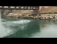 blue shorts back flip off bridge slap back