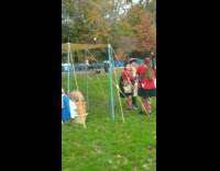 Guy sees people in red coats at park 
