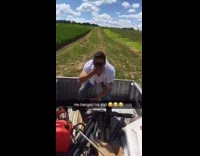 Guy hits himself in face with end of trimmer