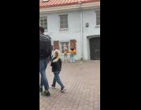 Two women yellow orange jacket tiktok dance