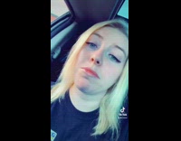 Lady rolls down car window glass detaches 