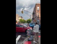 Man on street see rainbow and sing