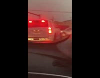 Guy driving microphone slow police  