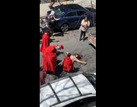 People act out Jesus death and resurrection in street
