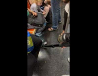 Collab winy - Man vacuum cleans the subway train floor