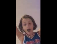 Kid bounces ball and shoots to the back and scored