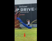 Guy poses brown playground yellow caution tape 