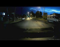 Man sees lightning across the night sky 