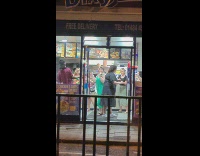 Group of people dance at fast food place 