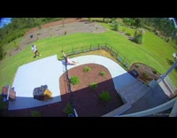 CCTV woman falls over backyard fence 