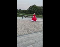 Woman red dress sash Washington Monument Park