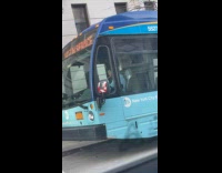 Driver on break practice flute inside bus