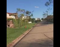 White shirt guy falls off skateboard rope 