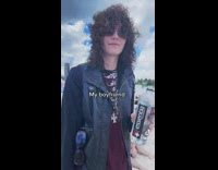 Guy wears leather jacket and pants to beach