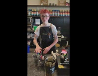 Person acting like coworker in coffee shop 