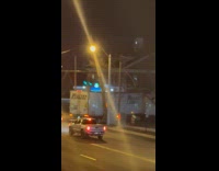 Truck reversing hits light post breaks stoplight 