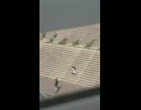 Two girls silver bodysuit hug sit steps 