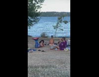 Guy blue mermaid tail black hat lake 