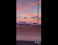 Man records the pink and orange skies