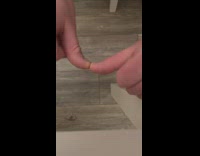 Guy pushes thumbs together 