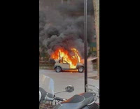 Golf cart on fire put out by civilian 