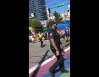 Collab BitchIG2 - Police officer walking by during pride parade people cheer