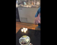 Little girl brings orange juice cup and spills a little