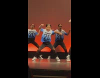 Little girl performing choreograph dance on stage