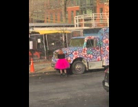 Woman pink skirt truck flowers paint job