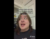 Guy black shirt long hair talking to camera 