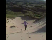 Blue Shirt Lady Running Down Sand Dune Hill Faceplants