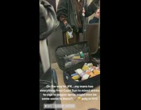 Man sells pepper spray, mixed drinks, and capri sun in a suitcase on subway train