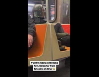 Man wears Boba Fett costume on train 