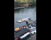 Woman in garbage bag for docks video