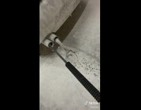 Car Wash Person Cleans Car Muffler with Soap