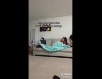 Woman runs off couch to see sisters reaction