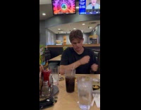 Man not being discreet looking towards friend was saying