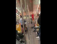 Elmo piñata on subway