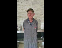 Grandpa tells a dirty joke with condom and coffin