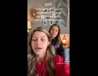 Girl in red hoodie guesses moms fingers eyes closed 