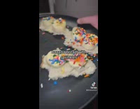 Little girl puts banana on bread microwave